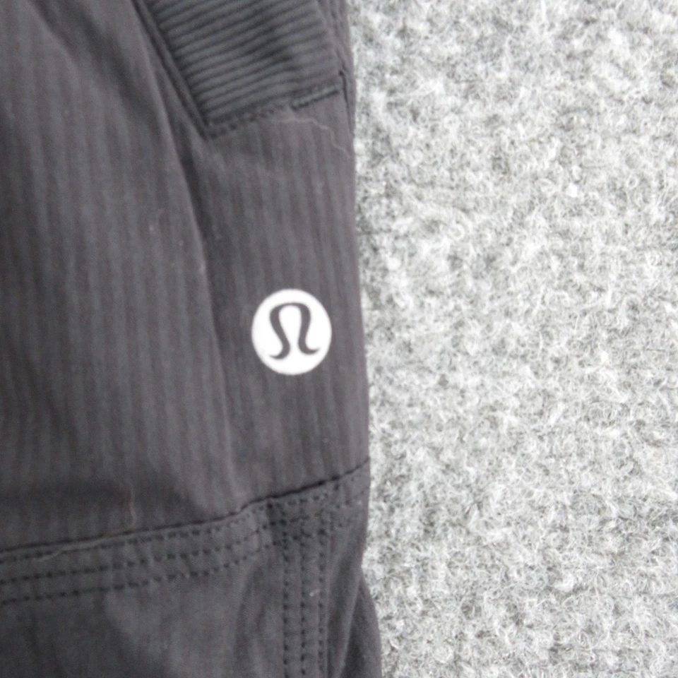Pantalones deportivos informales Lululemon para mujer 8 negros de estudio de nailon dobladillo ceñido Foto 4 de 4