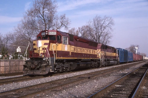 B: Orig Slide WC Wisconsin Central SD45 #6555+1 w/Train - Franklin Park IL 2003