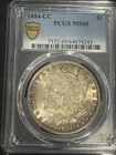 1884 CC Morgan Silver Dollar PCGS MS-60