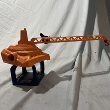 oranage and blue toy crane