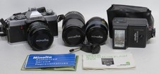 Minolta XG-7 35mm SLR Camera Bundle 200x Flash/Rokkor-X 28mm/135mm/50mm 3 Lens