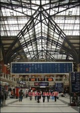 PHOTO LIVERPOOL STREET STATION THE INTERIOR OF THE STATION SHOWING THE TRAIN TI