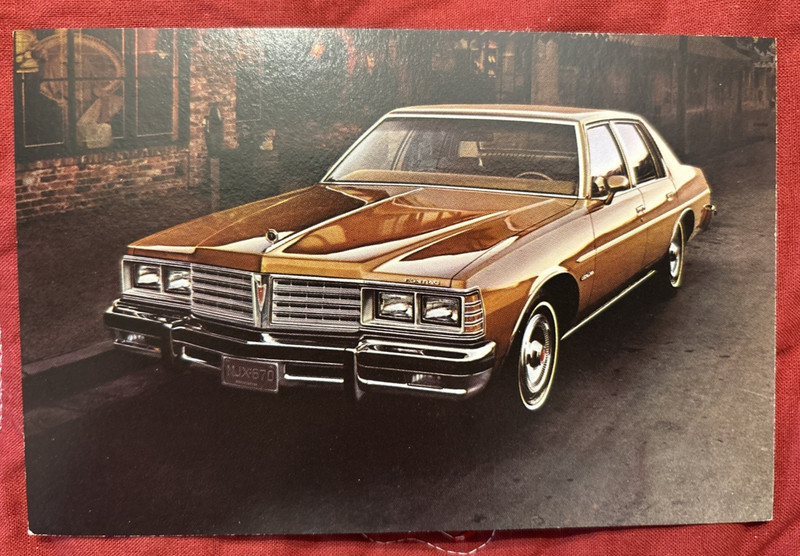 Vintage 1979 Pontiac Catalina dealership postcard St. Johns Michigan