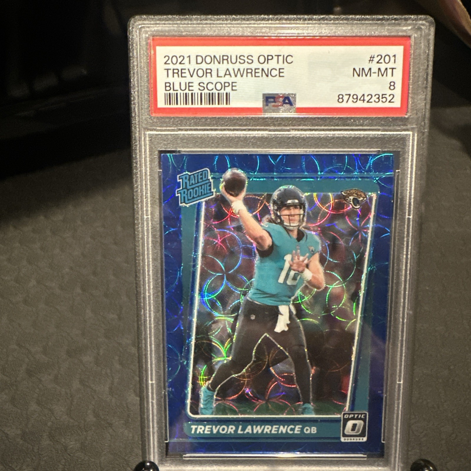 2021 Donruss Optic, Trevor Lawrence (RC), #201, Blue Scope Rated Rookie PSA 8