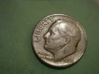 1950 D album filler Roosevelt Dime , actual coin in photo