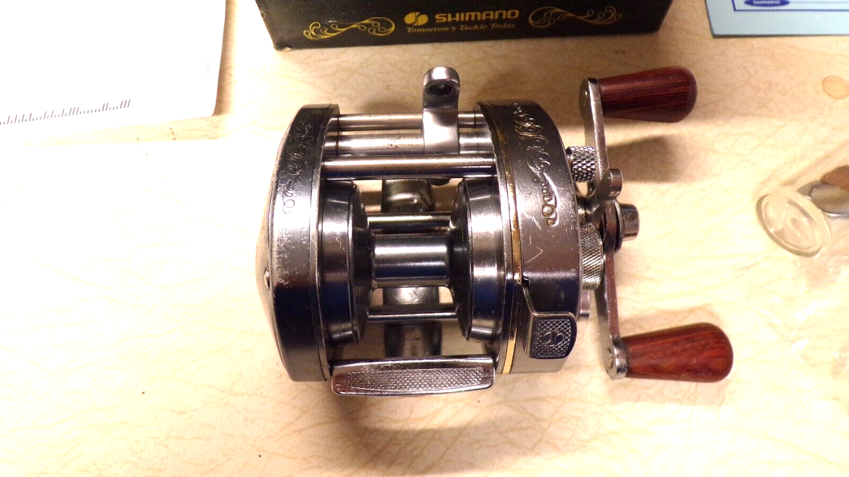 SHIMANO BANTAM FISHING REEL W/ BOX - BANTAM 100-EX - WORKS SHIMANO BANTAM FISHING REEL W/ BOX - BANTAM 100-EX - WORKS