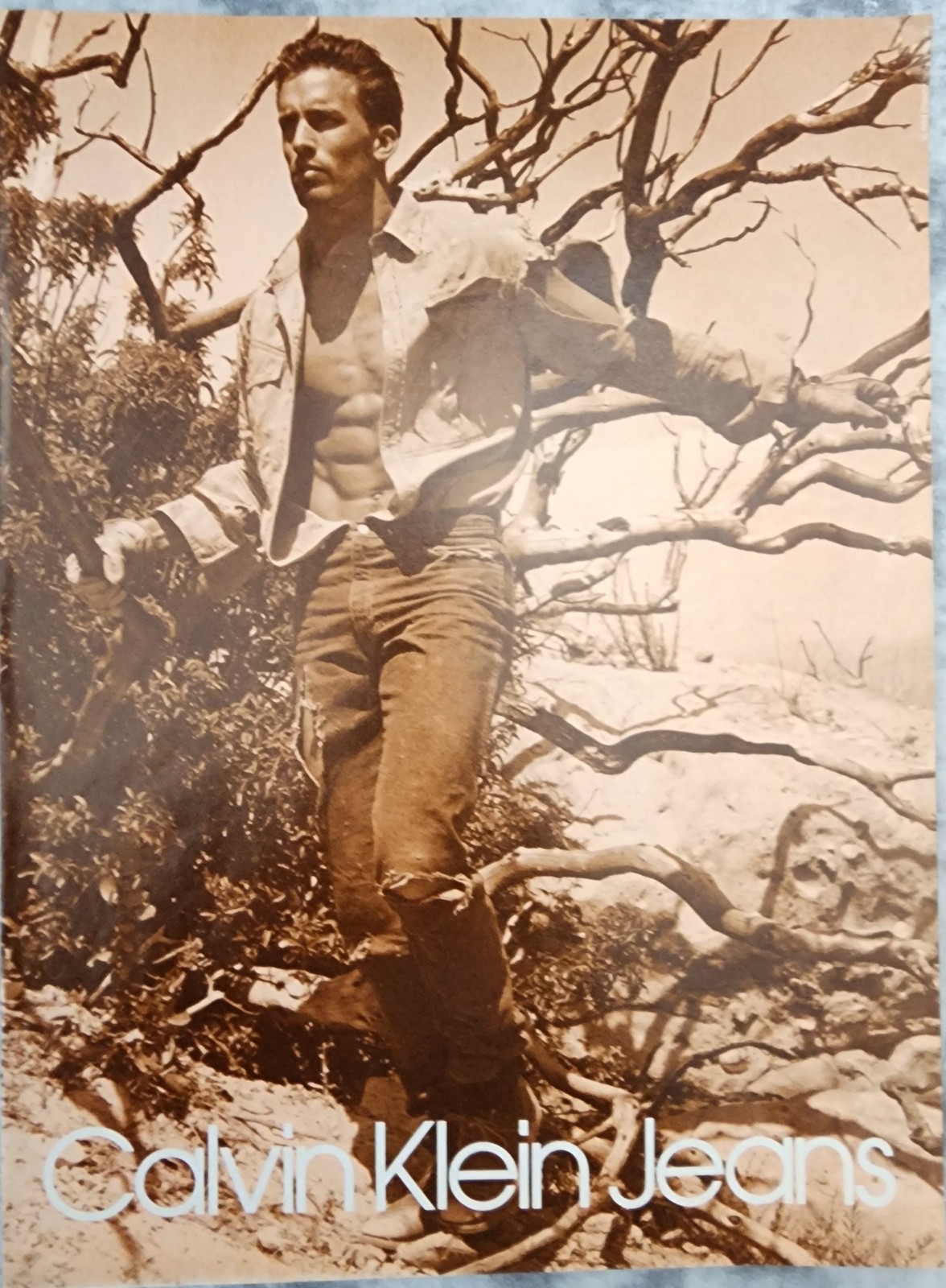 1984 Vintage Print Ad Calvin Klein Jeans Man Upside Down Tree Branches