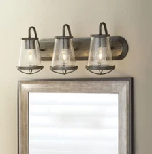 Georgina 24 in. 3-Light Weathered Iron Industrial Rustic Vanity with Clear Seede