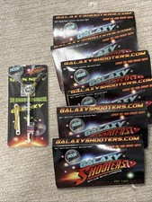 NIB 6 Galaxy Shooters Space Explorers 200 Foot Sling Shot Toy Game Light up