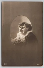 RPPC Couple Cheek to Cheek Thru Oval Style Window Real Photo c1908 Postcard F23