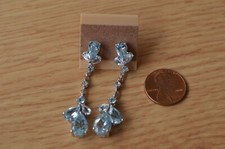 Pendientes colgantes de topacio/topacio azul cielo de 11,00 quilates enchapados en platino sobre plata fina
