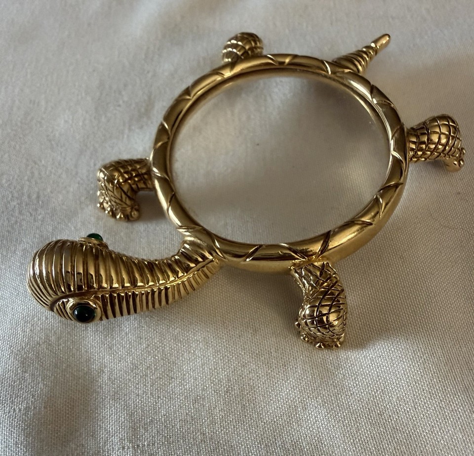 A Joan Rivers–branded gold-tone turtle magnifying glass that's equal parts functional desk tool and fabulous designer collectible.