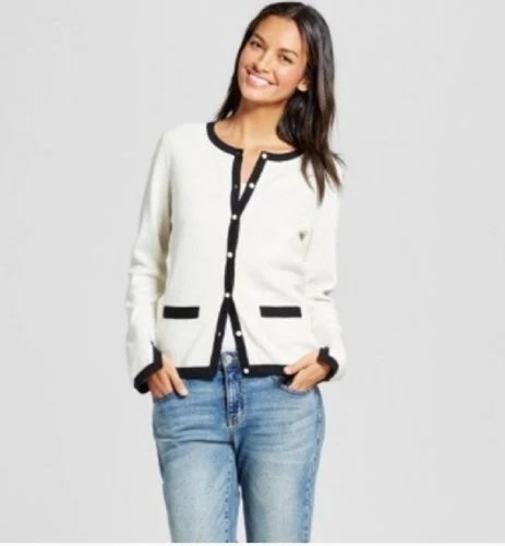 White cardigan shop with pearl buttons