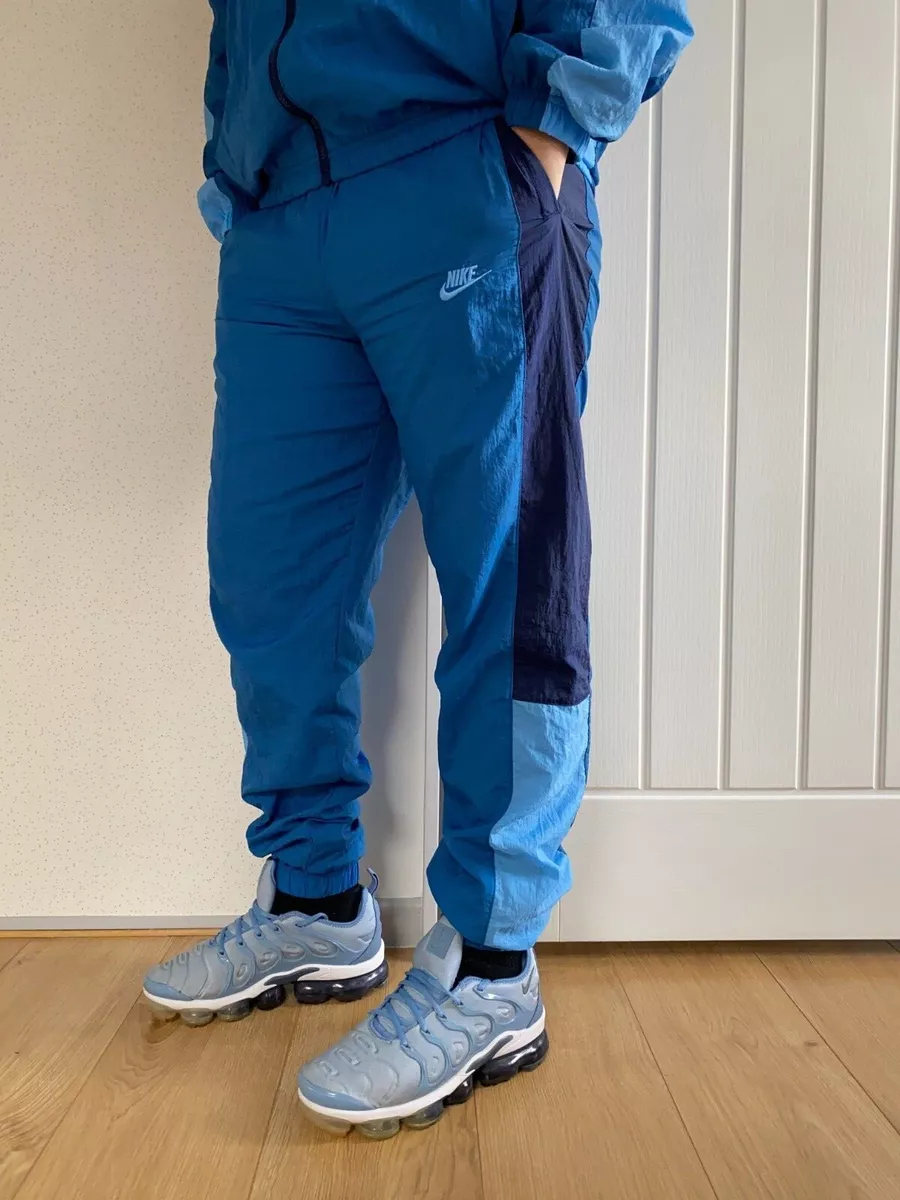 Nike woven sales tracksuit blue