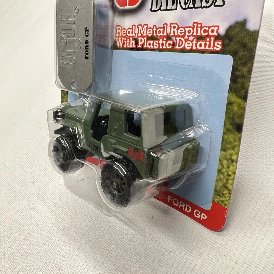 Nuevo GI Joe Ford GP réplica de metal fundido a presión 1:64 con etiqueta de perro coche juguete Foto 4 de 4