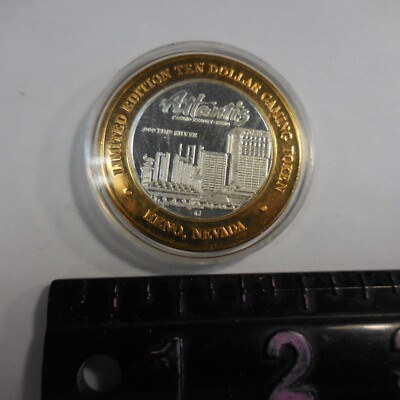 ATLANTIS CASINO RENO  $10 Silver Strike Token  - New Case