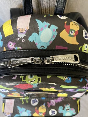 RARE LOUNGEFLY MONSTERS INC MINI BACKPACK DISNEY PARKS | eBay display picture 1