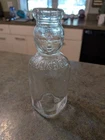 Vintage Embossed Baby Face Glass Milk Bottle Brookfield Dairy 9.5"