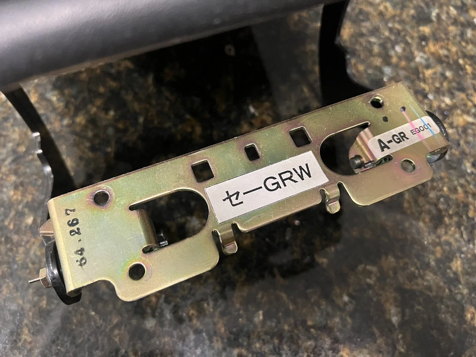 Infiniti M35 M45 2006-2010 consola central cuero negro reposabrazos conjunto tapa fabricante de equipos originales Foto 4 de 4