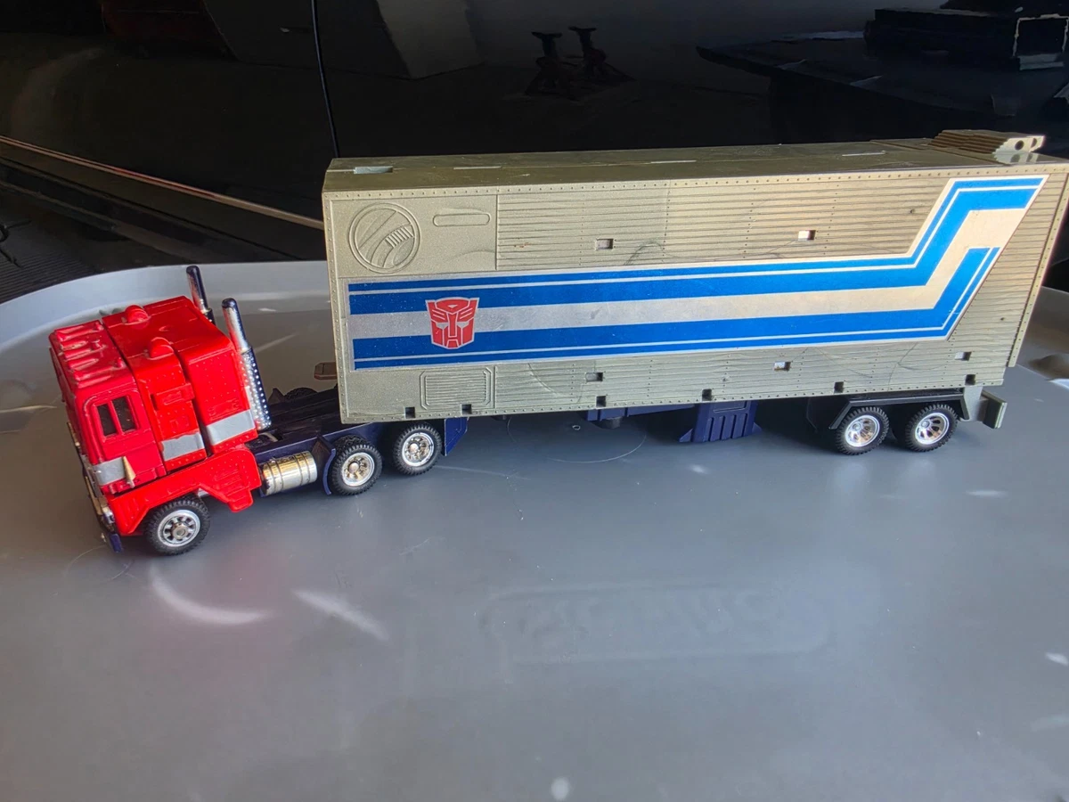 Preços baixos em Optimus Prime Figura de ação de Transformers e
