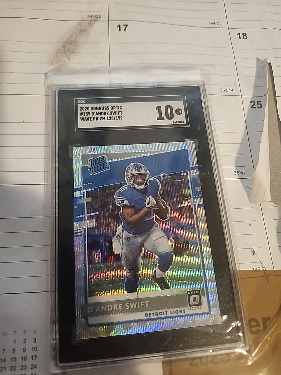 2020 Panini Donruss Optic Wave Rated Rookie DANDRE SWIFT Sgc 10 Lions (RC) /199