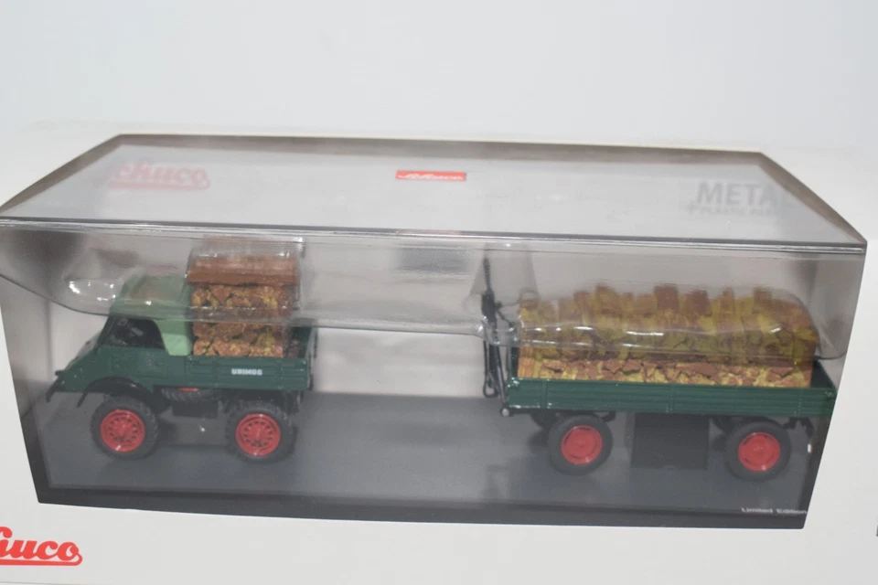 B95 1:43 SCHUCO 45 031 3300 SET MERCEDES-BENZ UNIMOG 401 CON RIMORCHIO MIB - Immagine 3 di 4