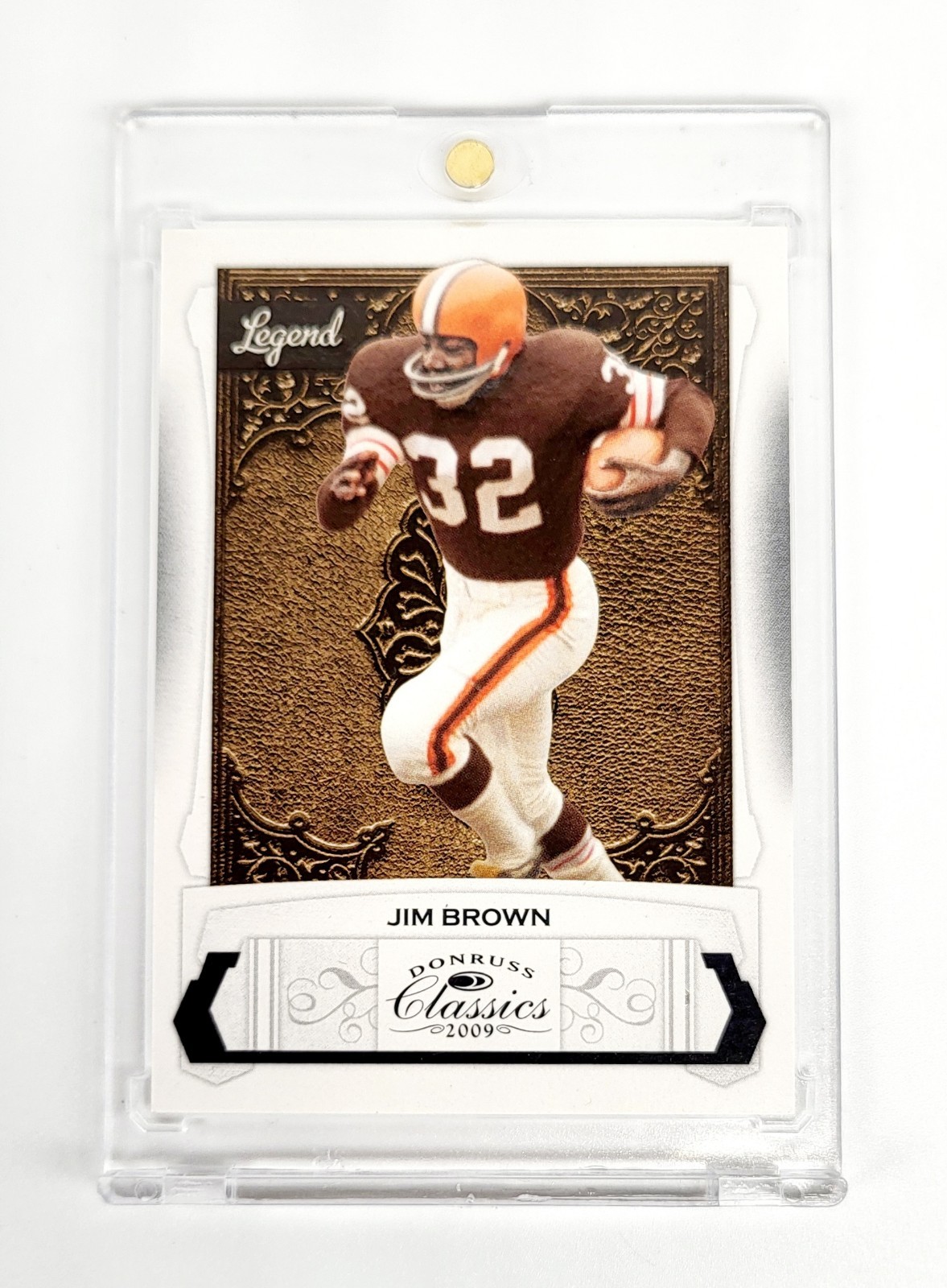 Jim Brown #124 Football Cards 2009 Panini Donruss Classics trading card — raw and PSA graded price guide