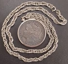 1904 Morgan Silver Dollar (with non-silver necklace)