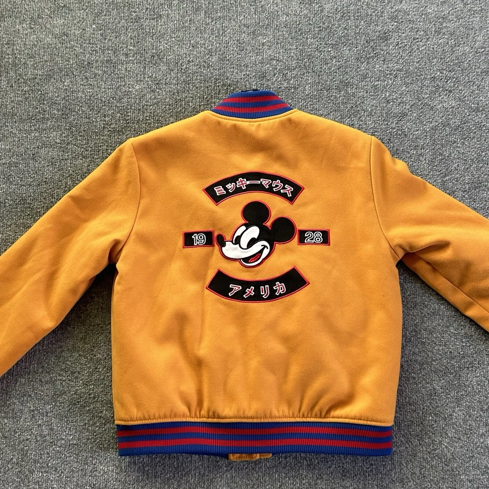 Chaqueta para mujer Forever 21 X Disney pequeña Mickey Mouse bombardero universitario mostaza Foto 2 de 4