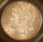 1891-O Morgan Dollar. ICG AU-55. Starts at .99. NO RESERVE.