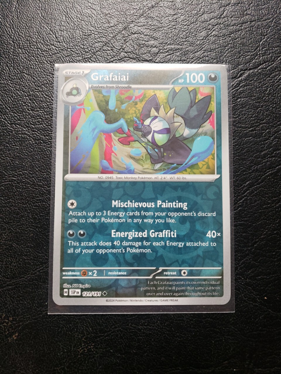 GRAFAIAI 121/191 SURGING SPARKS POKEMON (REVERSE HOLO, NM)