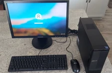 Acer Aspire system with monitor, keyboard and mouse.