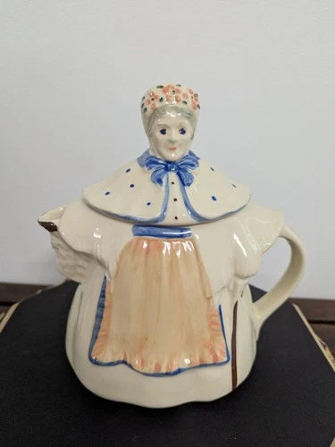 Vintage Shawnee Pottery "Granny Ann" teapot with pink apron, blue bow, 8.5" tall