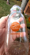 DECKER'S DAIRY, HIGHTSTOWN, New Jersey MILK Half Pint Orange Pyro Milk Bottle