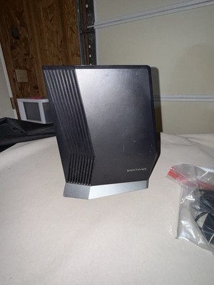 NETGEAR Nighthawk CAX80 AX6000 8-Stream Wi-Fi 6 Cable Modem Router