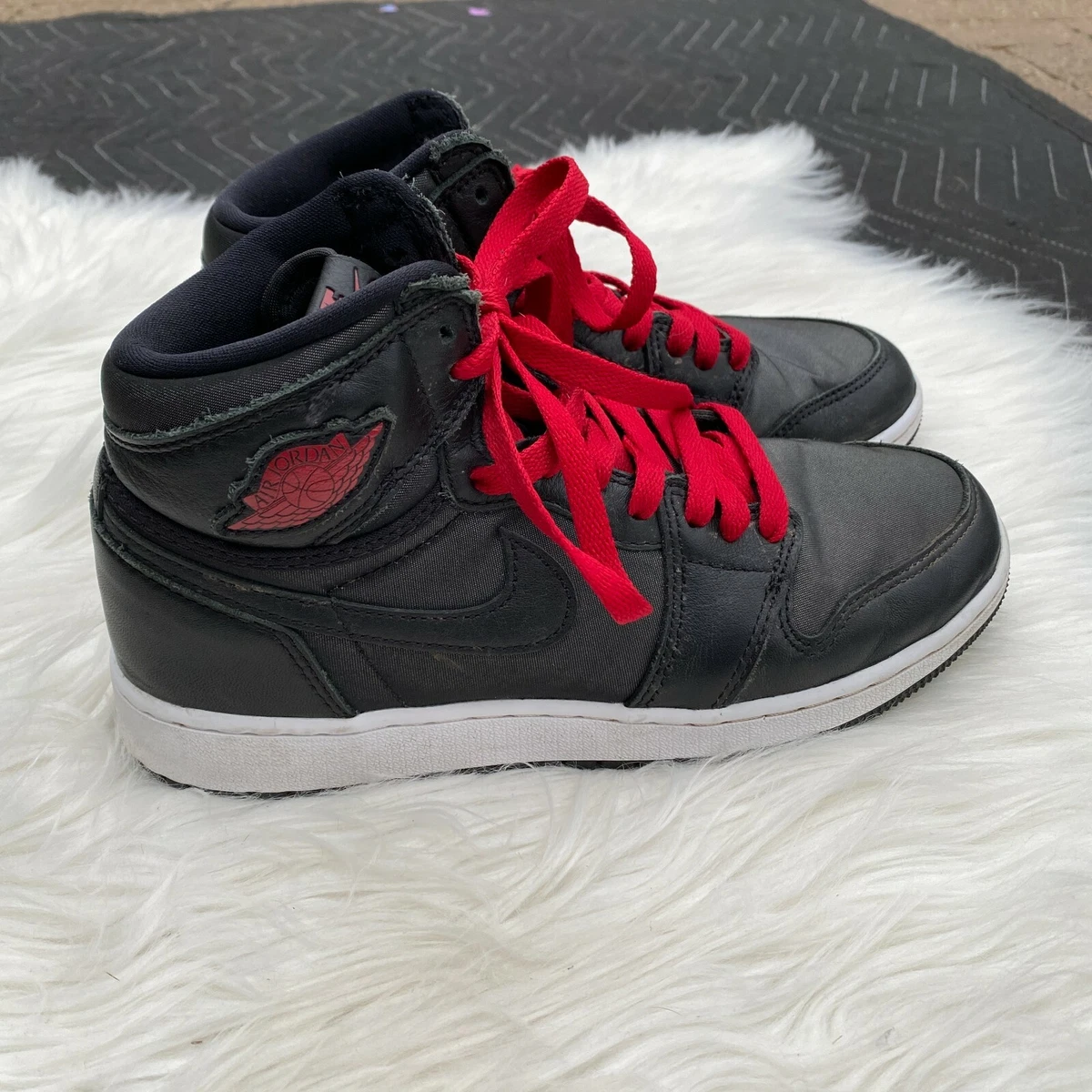 Black and top red kids jordans