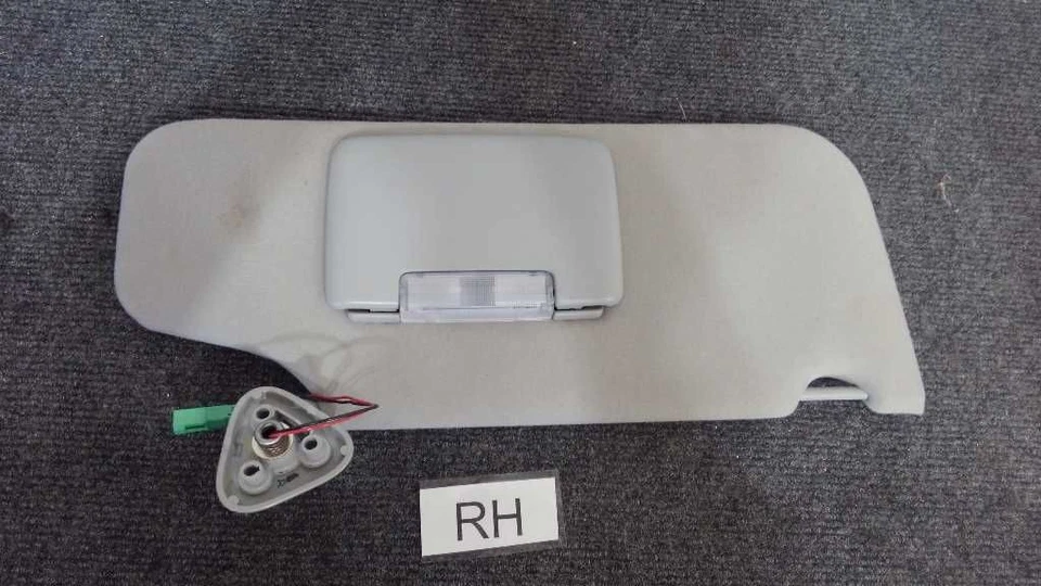 Parasol lado derecho para pasajero Mercury Montego 2005-07 *tela gris* con luz Foto 2 de 4