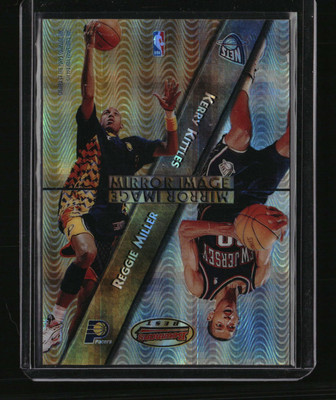 1997-98 Bowman's Best #MI9 Miller/Olajuwon Mirror Image Atomic Refractors