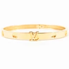 LOUIS VUITTON EmPreinte LV logo K18YG Au750 20.5g Bangle Yellow Gold 103557