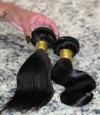 100% black natural Unprocessed human hair bun...
