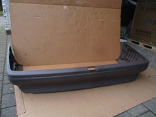 Opel Omega A Stoßstange Heckschürze hinten rear bumper NEU original GM braun