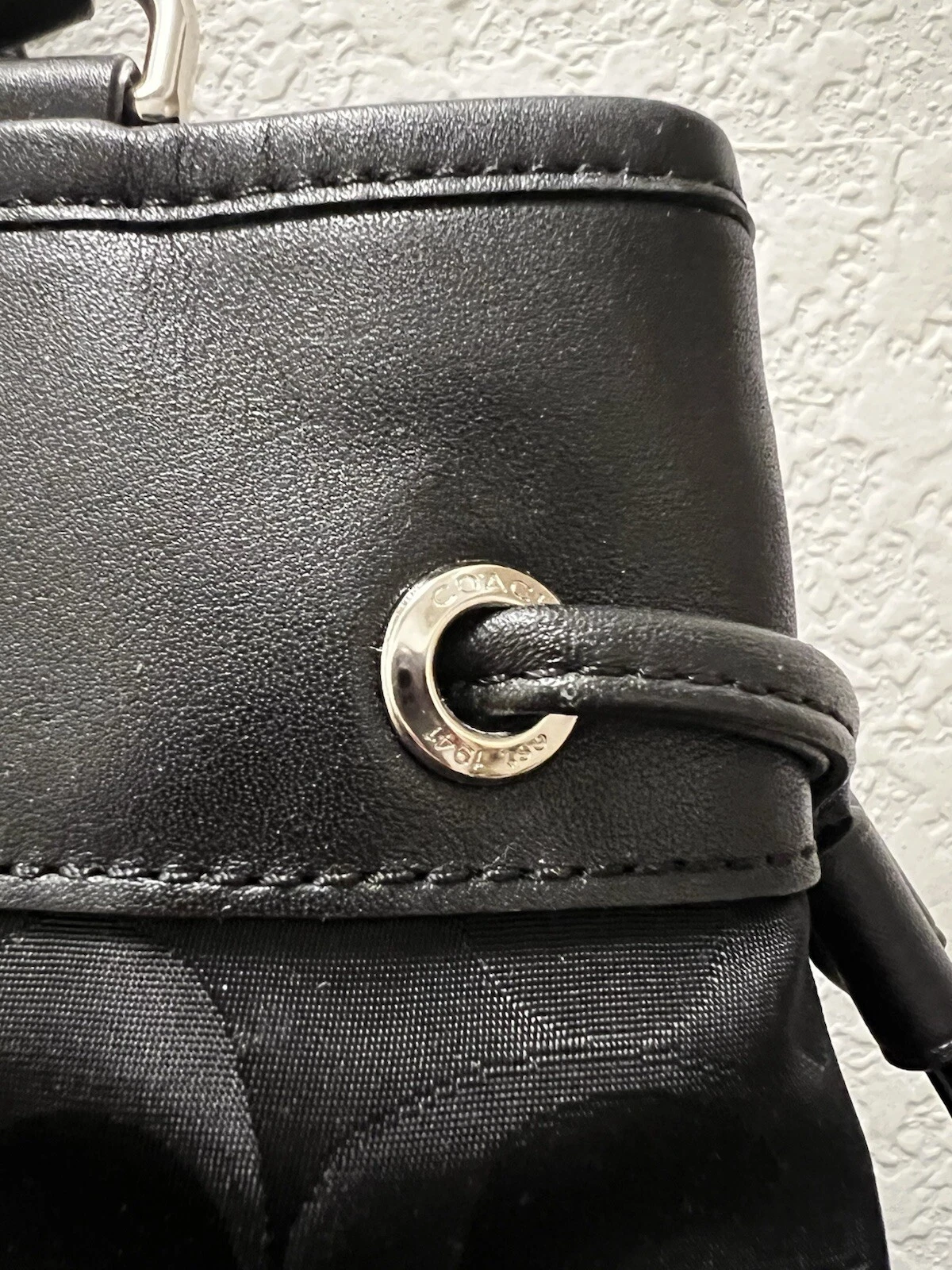 Borsa a tracolla Coach Signture C nera nylon bordo pelle coulisse espansione