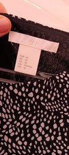 Kleid H&M Damen Gr. 40 Schwarz mit Weißen Pu...