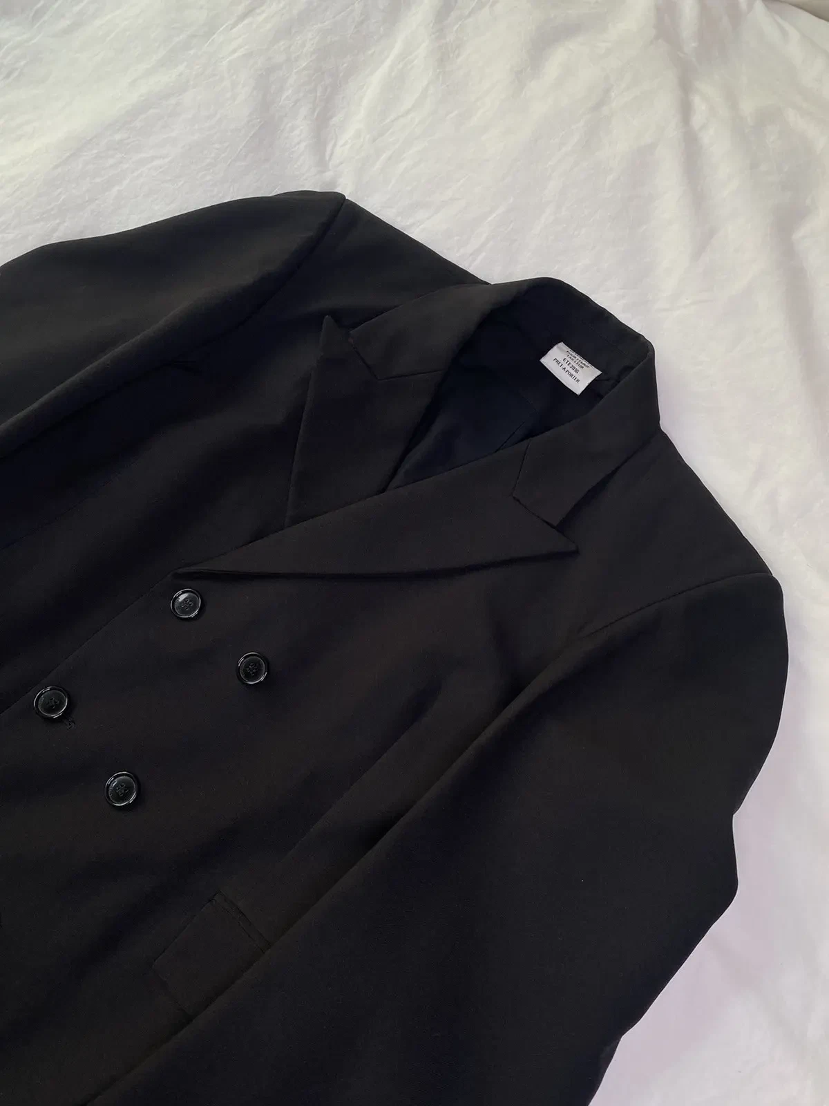 Vetements cappotto oversize donna nero passerella Demna Gvasalia doppiopetto