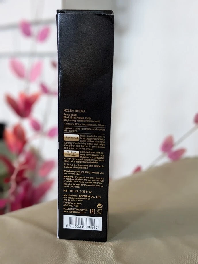 Tónico reparador de caracoles negros Holika Holika 3,38 fl oz - líquido hidratante para rostro  Foto 3 de 4