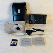 Canon PowerShot ELPH SD1000 Digital Camera 7.1MP Silver 2 Batt SD Case Charger