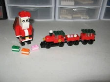 LEGO RETIRED JOLLY SANTA AND CHRISTMAS TRAIN PUT TOGETHER FOR PICTURES