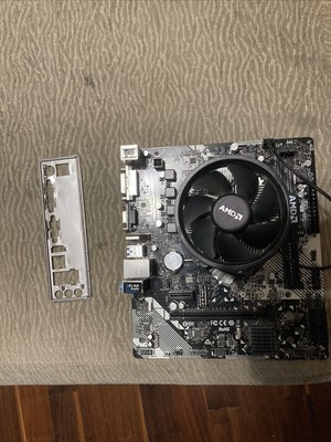 AS Rock B450 motherboard with ryzen 5 3600X and an AMD cpu cooler.