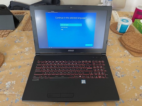 MSI GP62 15.6" FHD Gaming Laptop (Core i7-7700HQ, 8GB RAM, 128GB SSD, 1TB HDD, - Picture 1 of 5