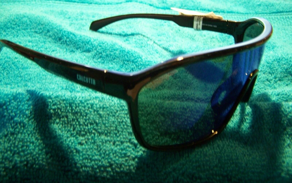 GAFAS DE SOL CALCUTTA RAPTOR MARCO NEGRO AZUL ESPEJO LENTES POLARIZADAS NUEVAS PARA 2024 Foto 2 de 4